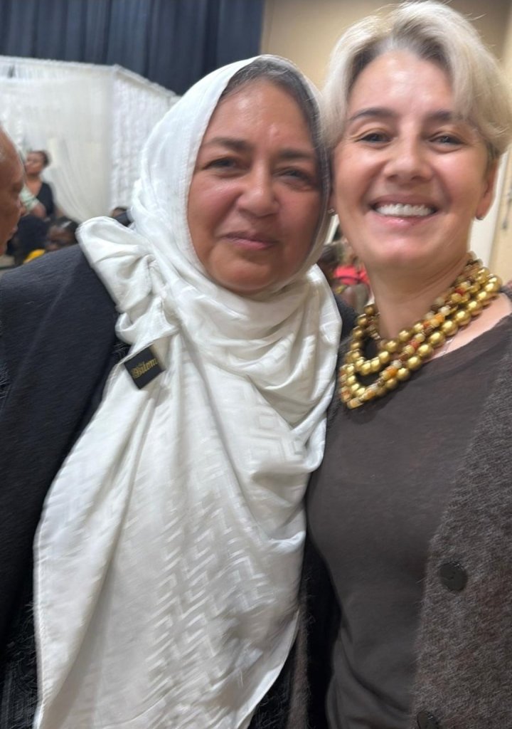 Bahira Abdulsalam with a supporter at a community event in Toronto